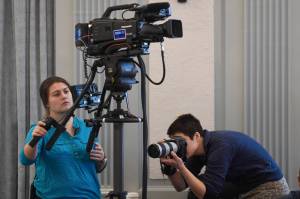 Bethany Lowrance, left, of Gavel Alaska, and Rashah McChesney, a reporter with the Alaska Energy Desk (a collaboration between stations of the Alaska Public Radio Network), cover a Senate Finance Committee meeting at the Capitol on Thursday, Feb. 14, 2019. Gov. Mike Dunleavys budget may end all state funding for public radio and broadcast stations. (Michael Penn | Juneau Empire)
