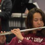 Flutist Xinlan Tanner rehearses during a KCHS Marching Band practice on Aug. 18, 2022, in Kenai, Alaska. (Jake Dye/Peninsula Clarion)