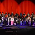 Audra Calloway directs the Soldotna High School Choir in a rehersal on Oct. 11, 2022, at Soldotna High School in Soldotna, Alaska. (Jake Dye/Peninsula Clarion)