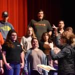 Audra Calloway directs the Soldotna High School Choir in a rehersal on Oct. 11, 2022, at Soldotna High School in Soldotna, Alaska. (Jake Dye/Peninsula Clarion)