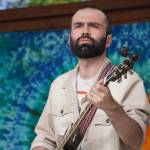 Matt Faubion performs as part of Blackwater Railroad Company during the Levitt AMP Soldotna Music Series on Wednesday, June 7, 2023, at Soldotna Creek Park in Soldotna, Alaska. (Jake Dye/Peninsula Clarion)