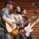 Blackwater Railroad Companys Tyson Davis, Matt Faubion and Ben Sayers perform during the Levitt AMP Soldotna Music Series on Wednesday, June 7, 2023, at Soldotna Creek Park in Soldotna, Alaska. (Jake Dye/Peninsula Clarion)