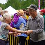 Attendees dance before the stage as Connie Brannocks Tiny House of Funk performs during the Soldotna Music Series at Soldotna Creek Park in Soldotna, Alaska, on Wednesday, June 21, 2023. (Jake Dye/Peninsula Clarion)