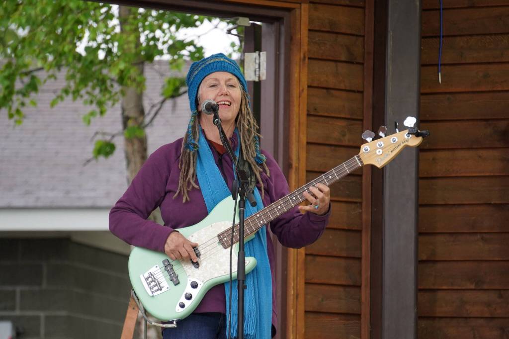 Liz Fletcher, part of Connie Brannocks Tiny House of Funk, performs during the Soldotna Music Series at Soldotna Creek Park in Soldotna, Alaska, on Wednesday, June 21, 2023. (Jake Dye/Peninsula Clarion)