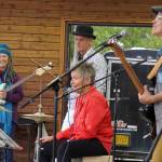 Connie Brannocks Tiny House of Funk performs during the Soldotna Music Series at Soldotna Creek Park in Soldotna, Alaska, on Wednesday, June 21, 2023. (Jake Dye/Peninsula Clarion)