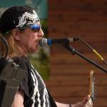 Scott Warner performs as part of Hot Mess at Soldotna Creek Park in Soldotna, Alaska, on Wednesday, Aug. 23, 2023. (Jake Dye/Peninsula Clarion)
