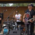 Scott Warner, Mark Gage and Ryan Bell perform as Hot Mess at Soldotna Creek Park in Soldotna, Alaska, on Wednesday, Aug. 23, 2023. (Jake Dye/Peninsula Clarion)