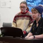 Hannah and Josiah Burton perform during Music by the Fire at the Soldotna Public Library in Soldotna, Alaska, on Thursday, Dec. 21, 2023. (Jake Dye/Peninsula Clarion)