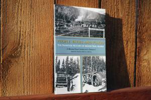 Jake Dye/Peninsula Clarion
A copy of People, Paths, and Places: The Frontier History of Moose Pass, Alaska stands in sunlight in Soldotna on Friday.