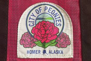 Photo by Emilie Springer/Homer News
Homers official peony patch is attached to a Nomar tote bag, available for purchase at the Homer Chamber of Commerce, during the month of July.