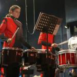 The Kenai Marching Band debuts their new routine based on The Hunger Games: The Ballad of Songbirds & Snakes during an exhibition at Kenai Central High School on Friday, Aug. 16, 2024. (Jake Dye/Peninsula Clarion)