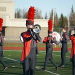 The Kenai Central High School Marching Band performs Snakes and Songbirds: The Music of the Hunger Games during the Kenai Marching Showcase at Ed Hollier Field in Kenai, Alaska, on Saturday, Sept. 21, 2024. (Jake Dye/Peninsula Clarion)