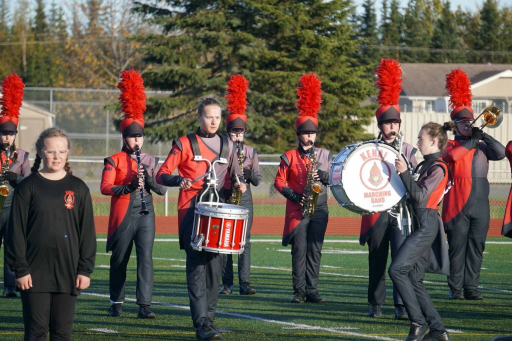 The Kenai Central High School Marching Band performs Snakes and Songbirds: The Music of the Hunger Games during the Kenai Marching Showcase at Ed Hollier Field in Kenai, Alaska, on Saturday, Sept. 21, 2024. (Jake Dye/Peninsula Clarion)