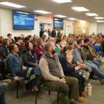 Parents and supporters of Aurora Borealis Charter School fill the Betty J. Glick Assembly Chambers during a meeting of the Kenai Peninsula Borough School District Charter Oversight Committee in Soldotna, Alaska, on Monday, Oct. 21, 2024. (Jake Dye/Peninsula Clarion)
