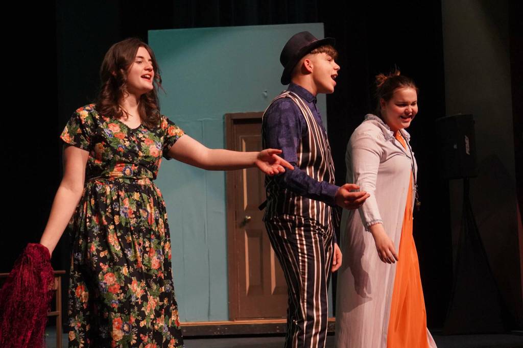The cast of Annie rehearse at Kenai Central High School in Kenai, Alaska, on Wednesday, Nov. 6, 2024. (Jake Dye/Peninsula Clarion)