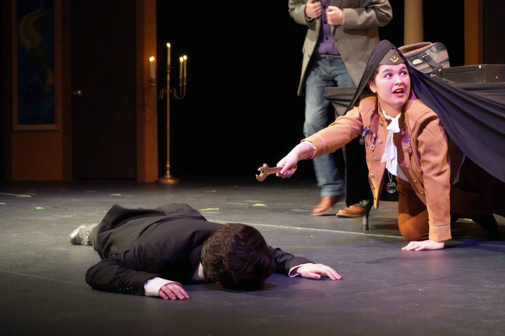 Lily Miles-Dafoe, as Colonel Mustard, rehearses Seward High School Theatre Collectives Clue at Seward High School in Seward, Alaska, on Thursday, Nov. 7, 2024. (Jake Dye/Peninsula Clarion)