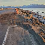 The southbound lane of Homer Spit Road, which was damaged by the Nov. 16 storm surge, is temporarily repaired with gravel and reopened on Thursday, Nov. 21, 2024, in Homer, Alaska. (Delcenia Cosman/Homer News)