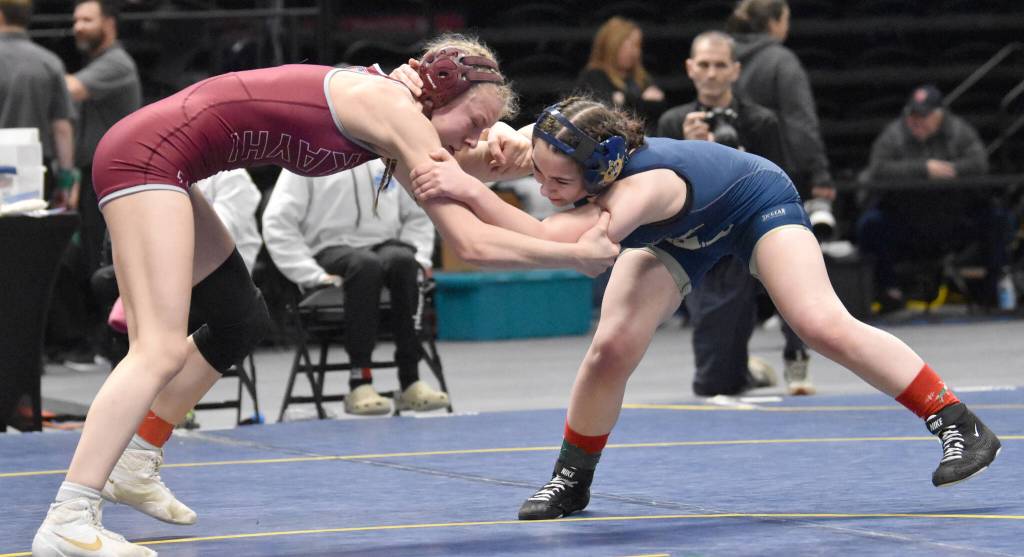 Homers Saoirse Cook wrestles to a pin against Ketchikans Summer Boling in the final at 132 pounds at the girls state wrestling tournament Saturday, Dec. 21, 2024, at the Alaska Airlines Center in Anchorage, Alaska. (Photo by Jeff Helminiak/Peninsula Clarion)