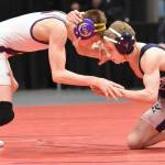 Lathrops Tanner Rhoton wrestles to a 4-3 decision over Soldotnas Sam Henry in the final at 103 pounds at the Division I state wrestling tournament Saturday, Dec. 21, 2024, at the Alaska Airlines Center in Anchorage, Alaska. (Photo by Jeff Helminiak/Peninsula Clarion)