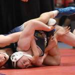 Soldotnas Jacob Strausbaugh wrestles to a technical fall against Student Wrestling Development Programs Brian Grabner in the final at 135 pounds at the Division I state wrestling tournament Saturday, Dec. 21, 2024, at the Alaska Airlines Center in Anchorage, Alaska. (Photo by Jeff Helminiak/Peninsula Clarion)