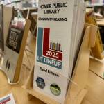 Brochures for the 2025 Lit Lineup are available at the front desk of the Homer Public Library and the lineups display, photographed on Friday, Jan. 3, 2025, in Homer, Alaska. Photo by Christina Whiting