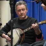 John Walsh performs during An Evening of Traditional Irish Music at Kenai Peninsula College in Soldotna, Alaska, on Friday, Jan. 24, 2025. (Jake Dye/Peninsula Clarion)