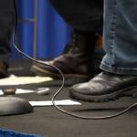 John Walsh, Jannell Canerday and Pat Broaders stamp their feet during An Evening of Traditional Irish Music at Kenai Peninsula College in Soldotna, Alaska, on Friday, Jan. 24, 2025. (Jake Dye/Peninsula Clarion)