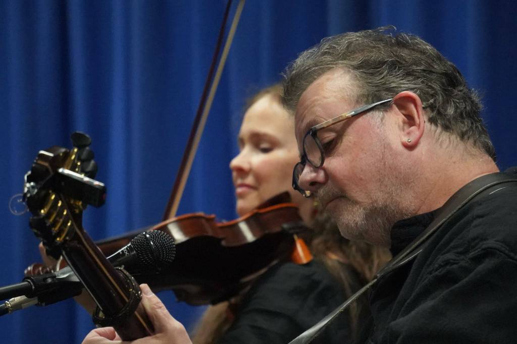 Jannell Canerday and Pat Broaders perform during An Evening of Traditional Irish Music at Kenai Peninsula College in Soldotna, Alaska, on Friday, Jan. 24, 2025. (Jake Dye/Peninsula Clarion)