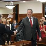 Republican Gov. Mike Dunleavy, right, shakes hands with House Majority Leader Chuck Kopp, an Anchorage Republican, before delivering his State of the State speech at the Alaska State Capitol on Tuesday, Jan. 28, 2025. (Klas Stolpe/Juneau Empire)