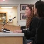 Milly Hornung and Halle Blades speak in opposition to a possible closure of Nikiski Middle/High School during a meeting of the Kenai Peninsula Borough School District in Soldotna, Alaska, on Monday, Feb. 3, 2025. (Jake Dye/Peninsula Clarion)