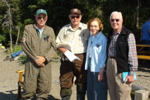 Left to right: Tom Griffiths, former Denali National Park chief ranger and refuge volunteer; Rick Johnston, Kenai National Wildlife Refuge pilot/ranger; Rosalynn Carter and former President Jimmy Carter are photographed at Alaska Wildland Adventures Kenai Back Country Lodge beach, Skilak Lake, Kenai National Wildlife Refuge<ins>,</ins> <ins>Alaska</ins>. (Photo by Kirk Hoessle/courtesy)