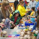 Students and families create puppets during a family art night hosted by Artist in Residence Shala Dobson at Kaleidoscope School of Arts and Science in Kenai, Alaska, on Thursday, Feb. 27, 2025. (Jake Dye/Peninsula Clarion)