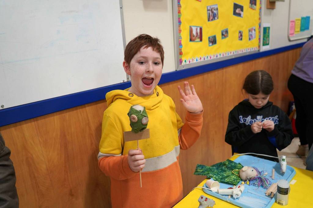 Students and families create puppets during a family art night hosted by Artist in Residence Shala Dobson at Kaleidoscope School of Arts and Science in Kenai, Alaska, on Thursday, Feb. 27, 2025. (Jake Dye/Peninsula Clarion)