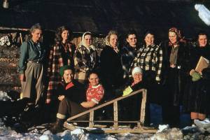 Photo courtesy of the Pratt Museum
During her brief time on the southern Kenai Peninsula, Dorothy Miller, wife of Cecil Greasy Miller, was a part of the Anchor Point Homemakers Club. Here, Dorothy (far left, standing) joins fellow area homemakers for a 1950 group shot. Sitting on the sled, in the red blouse, is Dorothys daughter, Evelyn, known as Evie.