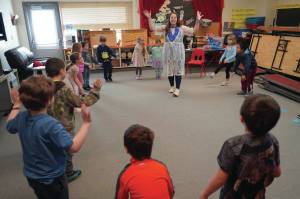 Delana Green teaches music to kindergarteners at Tustumena Elementary School in Kasilof on Friday, March 21. (Jake Dye/Peninsula Clarion)