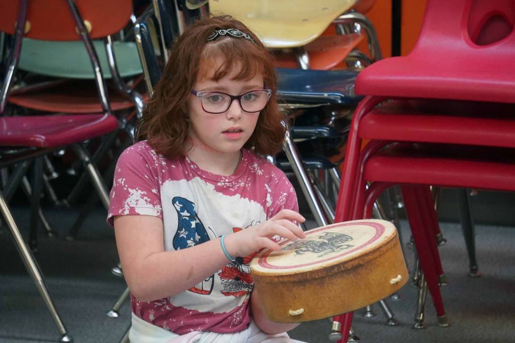 A second grader participates in a music lesson led by Delana Green at Tustumena Elementary School in Kasilof, Alaska, on Friday, March 21, 2025. (Jake Dye/Peninsula Clarion)