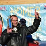 Tournament champion Zach Weimann holds up his first-place trophy during the 2025 Homer Winter King Salmon Tournament on Saturday, March 22, 2025, at the Deep Water Dock on the Homer Spit in Homer, Alaska. (Delcenia Cosman/Homer News)