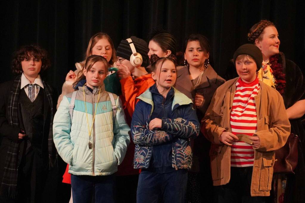 The cast of Seward High School Theatre Collectives Charlie and the Chocolate Factory rehearse on Thursday, April 3, 2025. (Jake Dye/Peninsula Clarion)