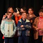 The cast of Seward High School Theatre Collectives Charlie and the Chocolate Factory rehearse on Thursday, April 3, 2025. (Jake Dye/Peninsula Clarion)