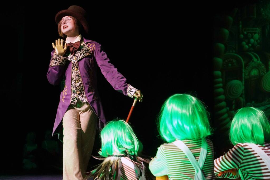 The cast of Seward High School Theatre Collectives Charlie and the Chocolate Factory rehearse on Thursday, April 3, 2025. (Jake Dye/Peninsula Clarion)