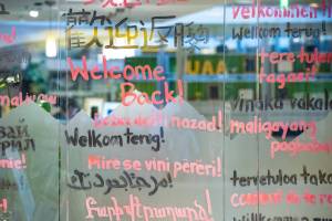 Welcome messages in multiple languages are painted on windows at the University of Alaska Anchorage at the start of the semester in January. (University of Alaska Anchorage photo)