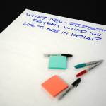 Sheets of paper solicit input on Kenais parks and recreation facilities and programs during the kickoff for a development of a parks and recreation master plan in Kenai, Alaska, on Tuesday, April 29, 2025. (Jake Dye/Peninsula Clarion)