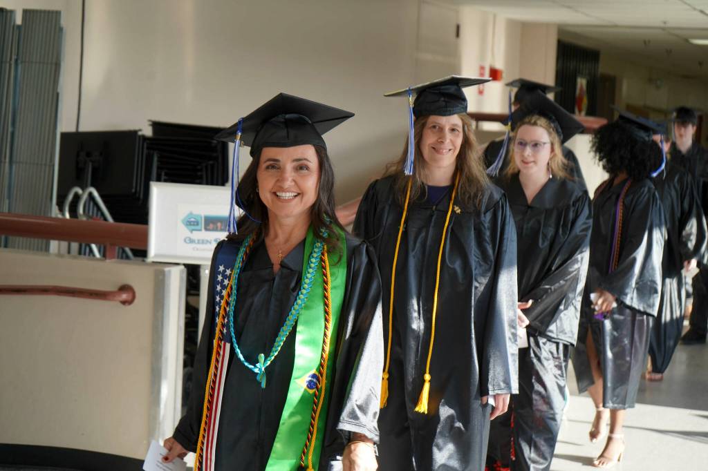 Graduates process into the 55th Annual Kenai Peninsula College Commencement Ceremony, held at Kenai Central High School in Kenai, Alaska, on Thursday, May 8, 2025. (Jake Dye/Peninsula Clarion)