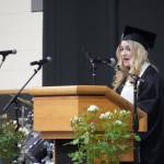 Nikiski graduate Belle Morris delivers an address during a commencement ceremony at Nikiski/Middle High School in Nikiski, Alaska, on Monday, May 19, 2025. (Jake Dye/Peninsula Clarion)