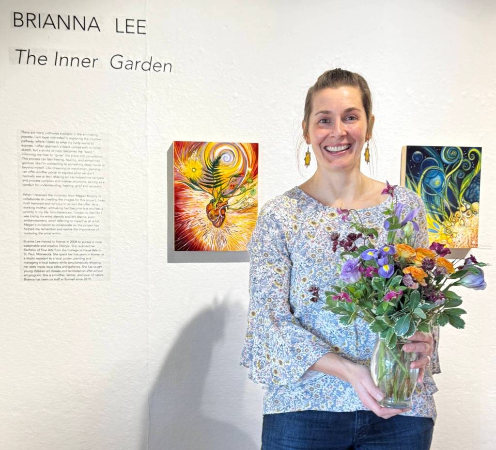 Artist Brianna Lee is photographed at the opening of her solo exhibit, The Inner Garden, on Friday, May 2, 2025, at Bunnell Street Arts Center in Homer, Alaska. Photo provided by Brianna Lee