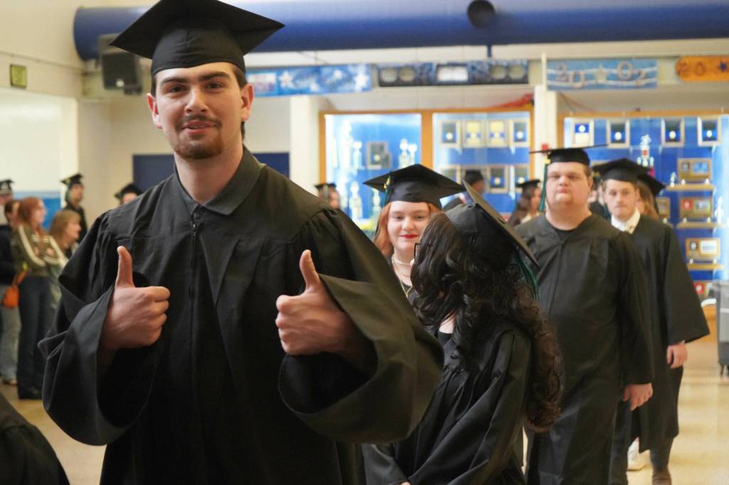 Students process into a graduation ceremony for Connections Homeschool in Soldotna, Alaska, on Thursday, May 22, 2025. (Jake Dye/Peninsula Clarion)