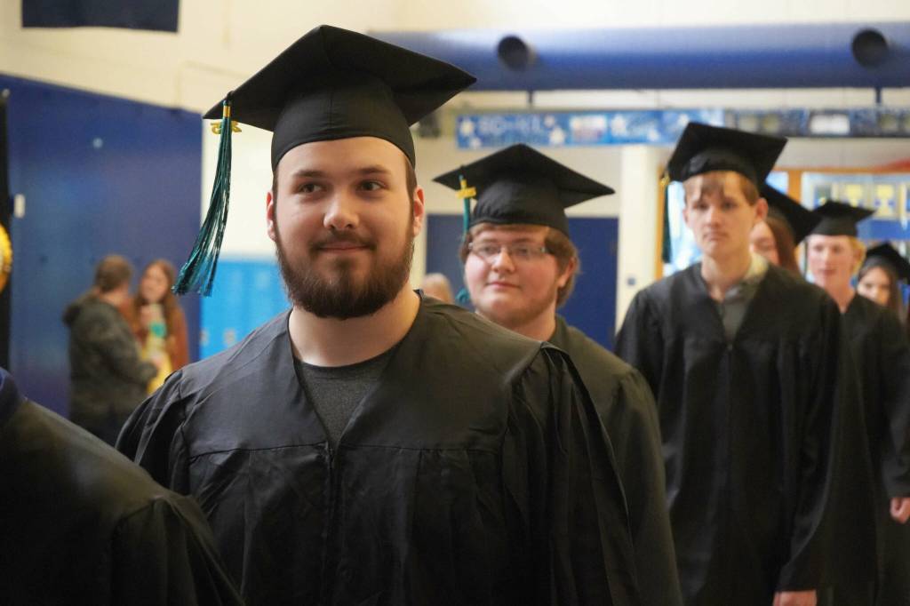 Students process into a graduation ceremony for Connections Homeschool in Soldotna, Alaska, on Thursday, May 22, 2025. (Jake Dye/Peninsula Clarion)