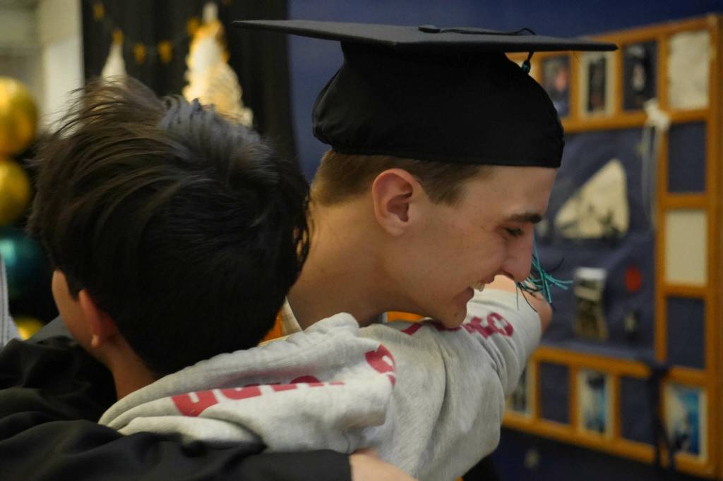 Students celebrate after a graduation ceremony for Connections Homeschool in Soldotna, Alaska, on Thursday, May 22, 2025. (Jake Dye/Peninsula Clarion)