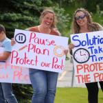 Swimmers and parents protest the proposed closure of Kenai Peninsula Borough School District pools outside of the Kenai Peninsula Borough Administration Building in Soldotna, Alaska, on Thursday, June 26, 2025. (Jake Dye/Peninsula Clarion)