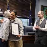 X̱unei Lance Twitchell receives his legislative citation from Rep. Andi Story, D Juneau, at a ceremony at the Alaska State Capitol on Saturday. (Ellie Ruel / Juneau Empire)